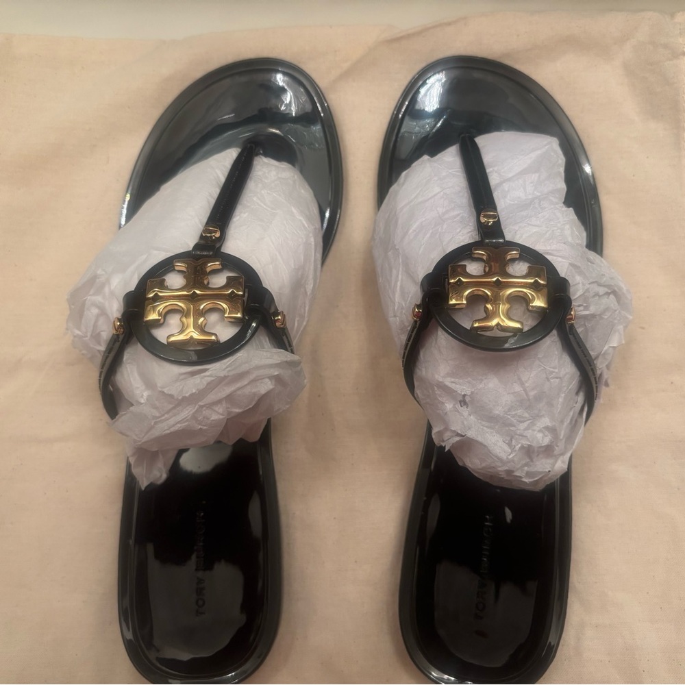 Tory Burch Glossy Black Sandals with Gold Emblem